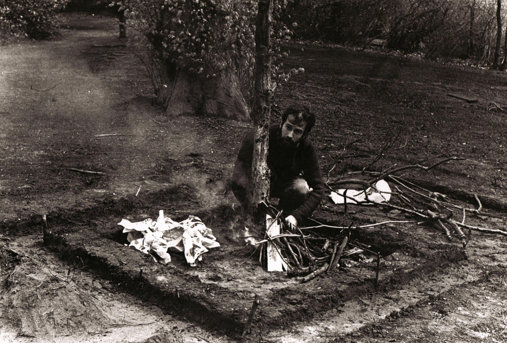 Outwork May 1977 - lighting fire at the centre